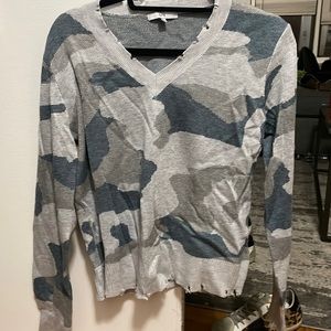Size small. Grey camo sweater with distressed detail. Excellent condition.